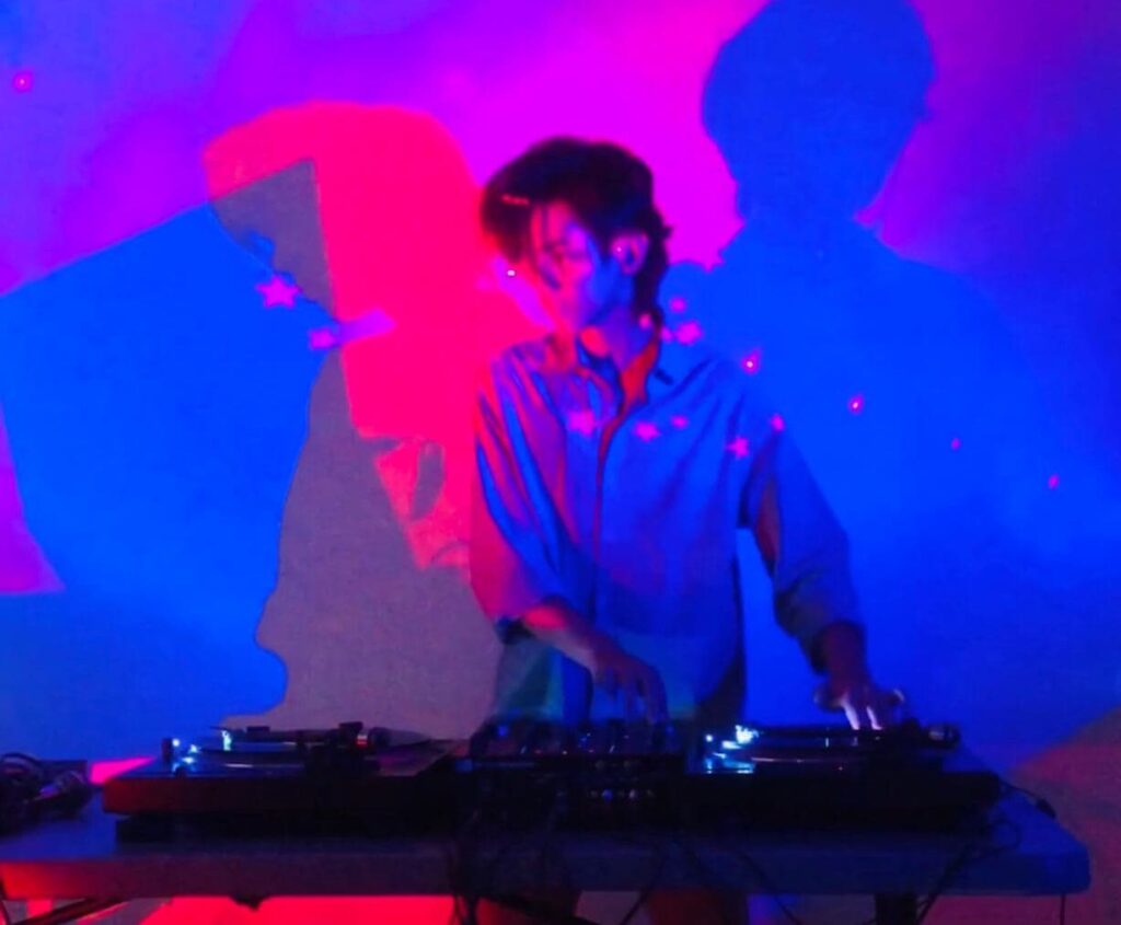 A DJ at the mixing desk