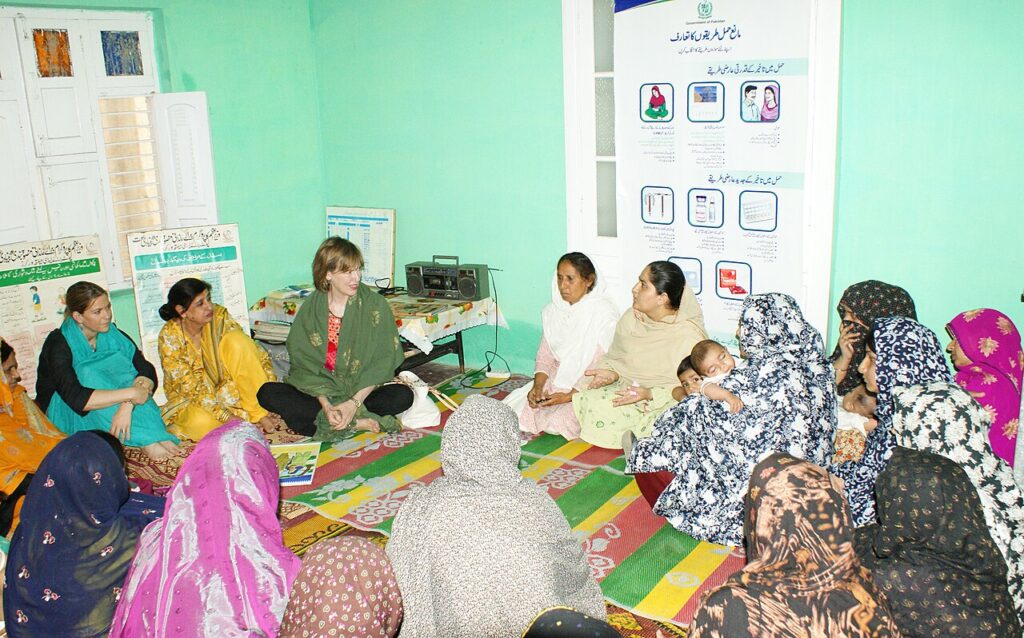 A Lady Health Worker training local women on maternal and child health at a health house near Jhelum, Punjab
