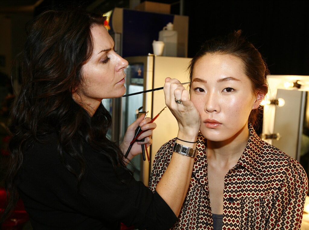 A makeup artist at work